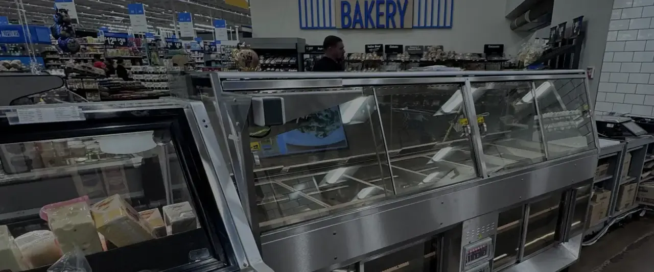 Stainless steel bakery display case installed in a retail store bakery department
